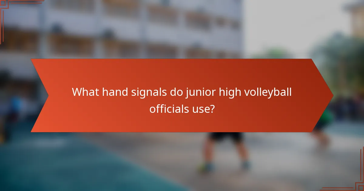 What hand signals do junior high volleyball officials use?
